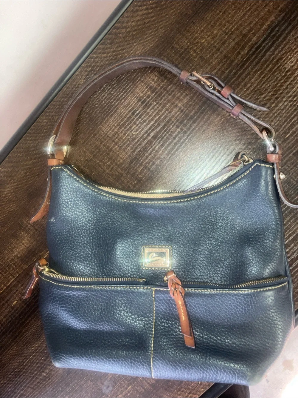 Dooney & Bourke Black Pebbled Leather Shoulder Bag with Brown Trim